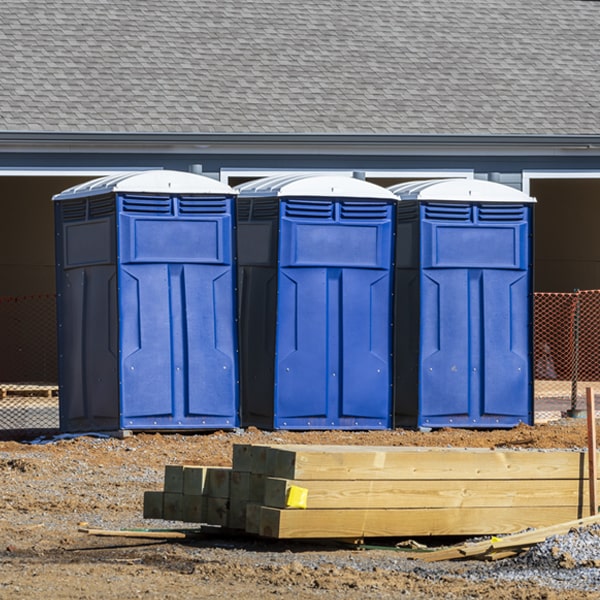 what is the cost difference between standard and deluxe porta potty rentals in Columbia Falls Montana